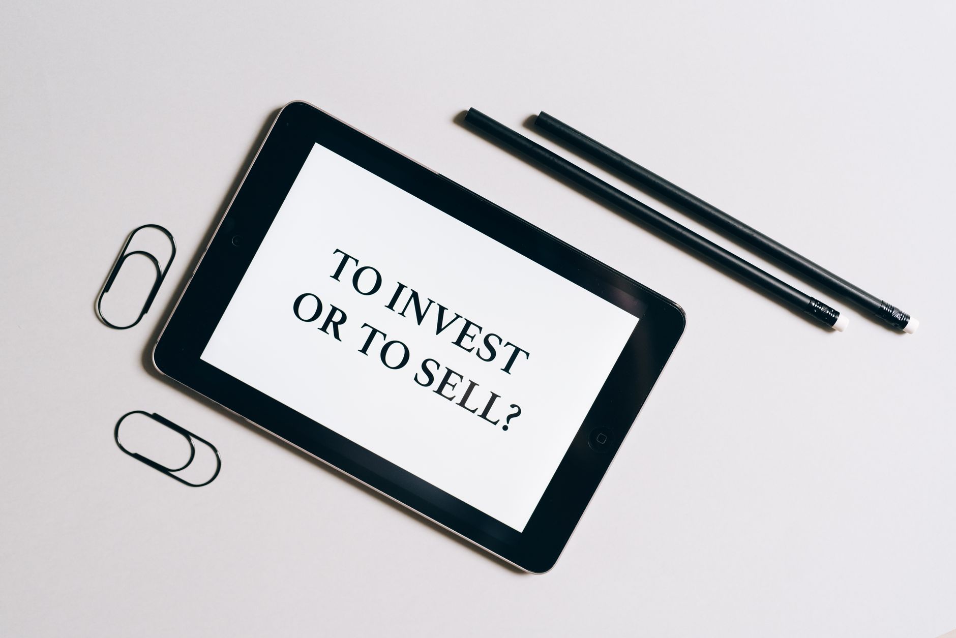Business professional reviewing digital asset investment charts